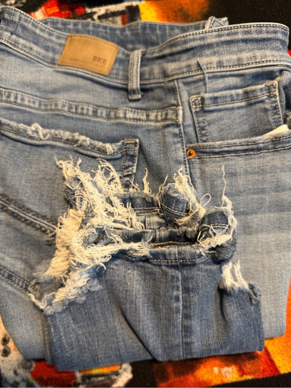 Buckle Light Blue Distressed Boyfriend Jeans
